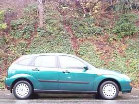 Click on this photo of the Ford Focus 1.6 Ghia 5 door Manual to enlarge... for sale at Scotts Garage Brighton